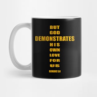 But God demonstrates his own love for us  romans 5-8 Mug